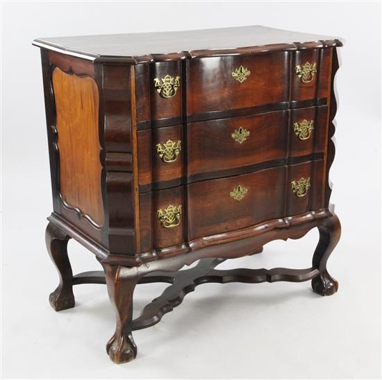 A South African stinkwood Dutch colonial style serpentine chest, W.2ft 11in.